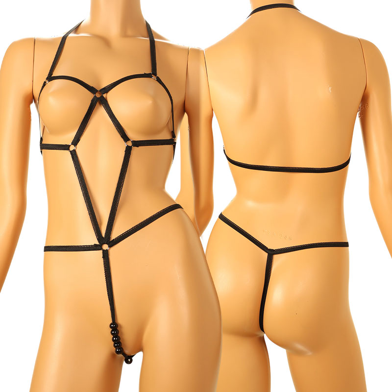 La-Pomme 526003: A costume lingerie set featuring six black balls, characterized by a soft and moderately stretchy fabric.