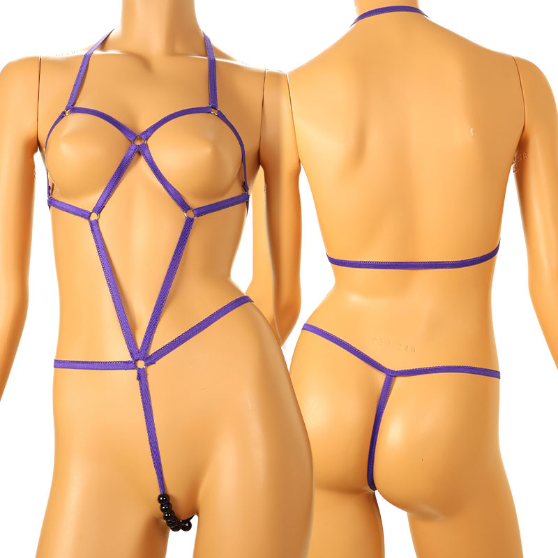 La-Pomme 526003: A costume lingerie set featuring six black balls, characterized by a soft and moderately stretchy fabric.