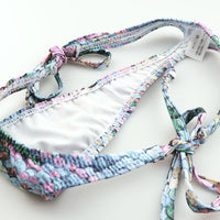 ユニセックス スパンコールプリント 上品微光沢ユニセックス極小脇ヒモTバック 723055