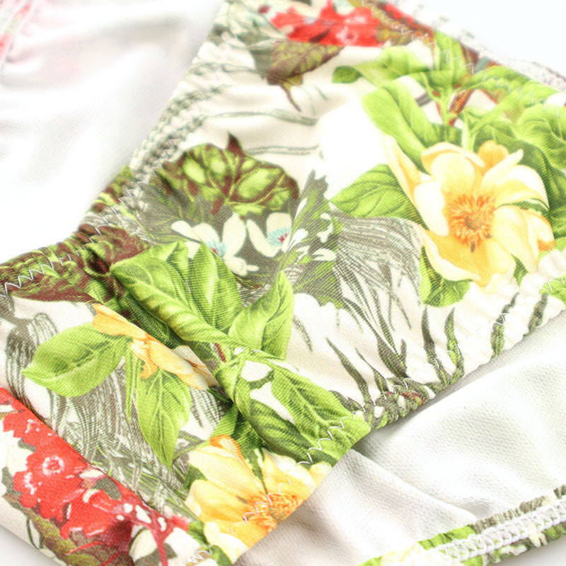 Men's soft, stretchy, slightly glossy fabric with an Amazon leaf print, low-rise, half-back bikini 723077